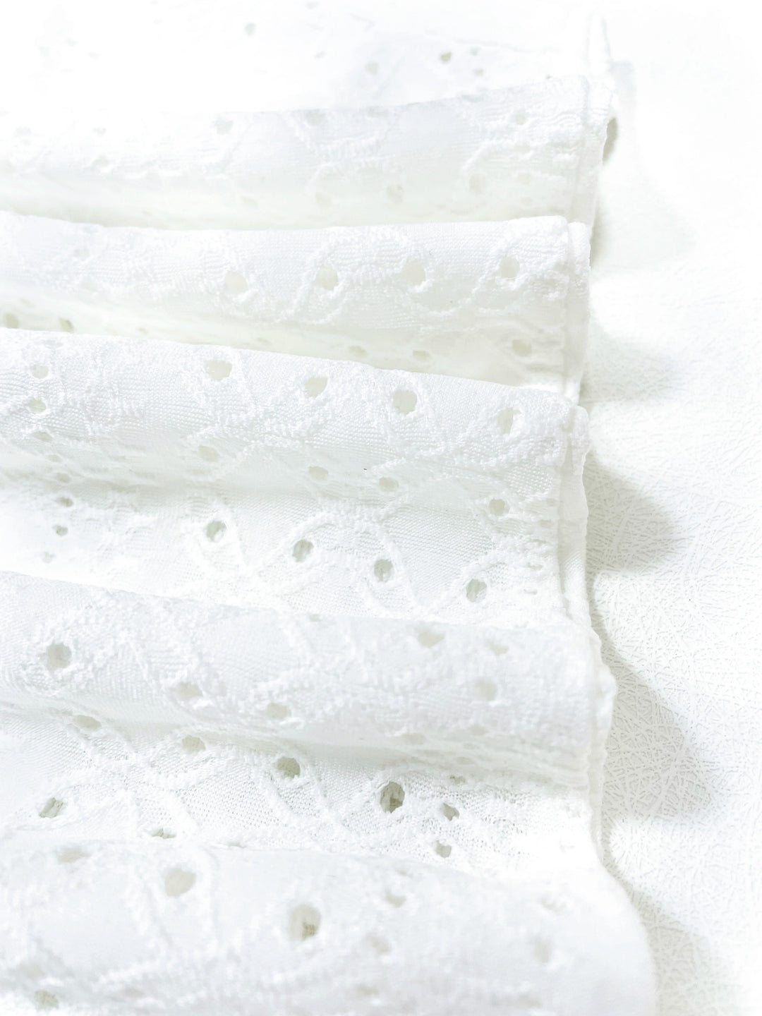 Andrea – Elegant Eyelet V-Neck Top